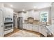 Well-appointed kitchen with stainless steel appliances and granite countertops at 101 Eden Glen Dr, Holly Springs, NC 27540