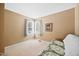 Neutral guest bedroom with carpet, bright windows, and daybed at 102 Legacy Ln, Durham, NC 27713