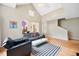 Spacious living room with vaulted ceilings, hardwood flooring, and bright natural light at 102 Legacy Ln, Durham, NC 27713
