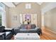 Spacious living room features vaulted ceilings and hardwood flooring at 102 Legacy Ln, Durham, NC 27713