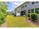 Backyard with patio, lawn, and fenced area at 1049 Lakebrink Dr, Morrisville, NC 27560