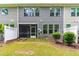 Backyard with patio, lawn, and fence at 1049 Lakebrink Dr, Morrisville, NC 27560