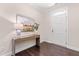 Entryway with a wooden console table, decorative lamp, and a painting creating a welcoming atmosphere at 1049 Lakebrink Dr, Morrisville, NC 27560