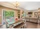 Open dining area with sliding door access to outdoor deck at 110 Lexington Ave, Zebulon, NC 27597