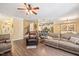 Spacious living room with an open layout connecting to the kitchen and dining area at 110 Lexington Ave, Zebulon, NC 27597