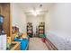A cluttered storage room with boxes, shelves, and a variety of household items at 110 Lexington Ave, Zebulon, NC 27597