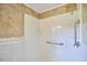 This bathroom showcases a walk-in shower with accessible handrails at 1105 Horseshoe Rd, Durham, NC 27703