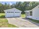 A house with a two car garage at 1105 Horseshoe Rd, Durham, NC 27703