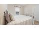 Bedroom with a comfortable bed, large window, and neutral decor at 1208 Dunn Creek Xing, Wake Forest, NC 27587