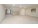 Spacious bonus room with multiple ceiling fans and natural light from a window at 1208 Dunn Creek Xing, Wake Forest, NC 27587