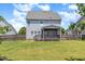 The back of the house shows a wooden porch at 123 Gunderson Ln, Garner, NC 27529