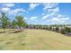 Spacious backyard features a lush lawn and attractive landscaping that creates a private outdoor space at 123 Gunderson Ln, Garner, NC 27529
