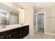 Bathroom with a double vanity and a walk-in shower at 123 Gunderson Ln, Garner, NC 27529