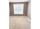 Neutral carpeted bedroom with gray walls and bright window at 123 Gunderson Ln, Garner, NC 27529