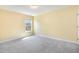 Bedroom with cream painted walls and carpeted floors at 123 Gunderson Ln, Garner, NC 27529