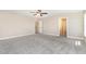 Spacious bedroom with a ceiling fan and neutral walls at 123 Gunderson Ln, Garner, NC 27529