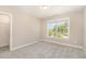 Bedroom with light-colored walls and bright window at 123 Gunderson Ln, Garner, NC 27529