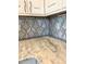 Close-up of a marble countertop with a decorative tile backsplash at 123 Gunderson Ln, Garner, NC 27529