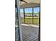 View from screened porch showcases the private backyard and deck at 123 Gunderson Ln, Garner, NC 27529