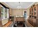 Traditional dining room with a wooden table, chandelier, and elegant decor at 123 Holiday Island Dr, Garner, NC 27529