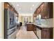 Spacious kitchen with stainless steel appliances, granite countertops, and ample storage at 123 Holiday Island Dr, Garner, NC 27529