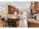 Modern kitchen featuring stainless steel appliances, updated countertops, and breakfast bar seating at 123 Holiday Island Dr, Garner, NC 27529