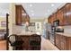 Well-equipped kitchen with stainless steel appliances, granite countertops, and ample cabinet space at 123 Holiday Island Dr, Garner, NC 27529