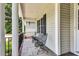 Comfortable outdoor seating area with two chairs, offering a relaxing space on the porch at 123 Holiday Island Dr, Garner, NC 27529