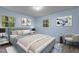 Comfortable bedroom with lots of natural light from the windows and stylish décor at 1302 Buffaloe Rd, Garner, NC 27529