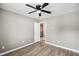 Vacant bedroom featuring new floors, neutral-colored walls, and a ceiling fan at 131 Cricketgrass Dr, Cary, NC 27513