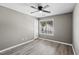 A vacant bedroom with new floors, a window, and natural light at 131 Cricketgrass Dr, Cary, NC 27513