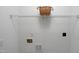 This laundry room has white walls and wire shelving for storage at 131 Cricketgrass Dr, Cary, NC 27513