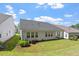 Well-maintained backyard and exterior of home at 131 English Violet Ln, Raleigh, NC 27610