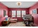 Office space with a large window and hardwood floors at 131 English Violet Ln, Raleigh, NC 27610