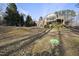 Spacious backyard featuring a screened-in porch, deck, and fencing for a comfortable outdoor living at 1401 Granada Dr, Raleigh, NC 27612