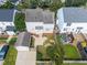 Aerial of house with landscaped backyard featuring a deck and patio set at 148 Danesway Dr, Holly Springs, NC 27540