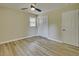 Comfortable bedroom with ceiling fan, closet, and natural light at 1592 Boone Rd, Elon, NC 27244