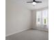 Bedroom with neutral carpet, a ceiling fan, and white curtains over the windows at 1662 Beechaven Rd, Fuquay Varina, NC 27526