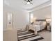 Spacious main bedroom with trey ceiling and a view to the main bathroom at 1662 Beechaven Rd, Fuquay Varina, NC 27526
