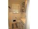 Bright bathroom featuring modern fixtures, white shiplap walls, and a clean, updated vanity area at 1700 Warrenton Rd, Henderson, NC 27537