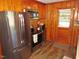 Efficient kitchen featuring stainless steel appliances and direct access to the backyard at 1700 Warrenton Rd, Henderson, NC 27537