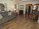 Inviting living room with hardwood floors, comfortable seating, and an open floor plan at 1700 Warrenton Rd, Henderson, NC 27537