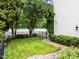 Well-maintained backyard featuring a lush lawn and beautiful landscaping at 1711 Happiness Hill Ln, Raleigh, NC 27614