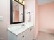 Clean bathroom featuring a vanity, mirror, and neutral color scheme at 1911 Falls Landing Dr # 106, Raleigh, NC 27614