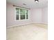 Well-lit bedroom with a large window, perfect for relaxation and rest at 1911 Falls Landing Dr # 106, Raleigh, NC 27614