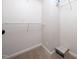 Walk-in closet with ample storage space for clothes and accessories at 1911 Falls Landing Dr # 106, Raleigh, NC 27614
