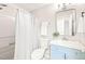 Bathroom featuring modern vanity, fixtures, shower/tub, and large mirror at 2309 Hoot Owl Ct, Raleigh, NC 27603