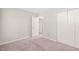 Bedroom with a closet and an open doorway at 2309 Hoot Owl Ct, Raleigh, NC 27603