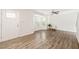 Inviting living room featuring wood floors, a bay window with bright natural light, and a ceiling fan at 2309 Hoot Owl Ct, Raleigh, NC 27603