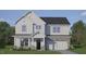 New two-story home with white siding, stone accents, a dark roof, and an attached two-car garage at 2325 Horton Park Dr, Apex, NC 27539